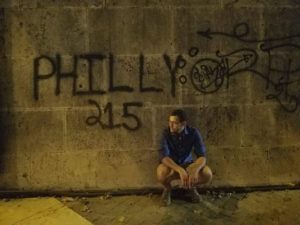 Robin with Philly-style graffiti in Rome, "Philly 215."